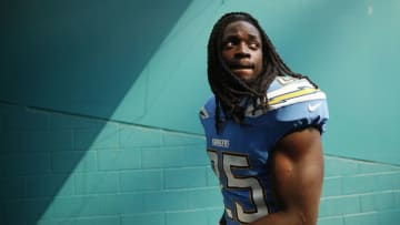 MIAMI, FLORIDA - SEPTEMBER 29: Melvin Gordon #25 of the Los Angeles Chargers walks off the field after the game against the Miami Dolphins at Hard Rock Stadium on September 29, 2019 in Miami, Florida. (Photo by Michael Reaves/Getty Images)