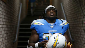OAKLAND, CALIFORNIA - NOVEMBER 07: Melvin Gordon #25 of the Los Angeles Chargers walks out from the tunnel before the game against the Oakland Raiders at RingCentral Coliseum on November 07, 2019 in Oakland, California. (Photo by Lachlan Cunningham/Getty Images)