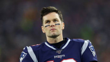 FOXBOROUGH, MASSACHUSETTS - JANUARY 04: Tom Brady #12 of the New England Patriots looks on during the the AFC Wild Card Playoff game against the Tennessee Titans at Gillette Stadium on January 04, 2020 in Foxborough, Massachusetts. (Photo by Maddie Meyer/Getty Images)