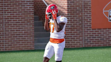 MOBILE, AL - JANUARY 30: Tight End Tre' McKitty #87 from Georgia of the American Team warms up before the start of the 2021 Resse's Senior Bowl at Hancock Whitney Stadium on the campus of the University of South Alabama on January 30, 2021 in Mobile, Alabama. The National Team defeated the American Team 27-24. (Photo by Don Juan Moore/Getty Images)