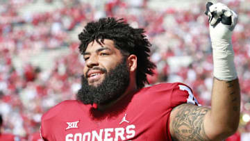 NORMAN, OK - OCTOBER 27: Offensive lineman Cody Ford #74 of the Oklahoma Sooners gestures to the crowd before the game against the Kansas State Wildcats at Gaylord Family Oklahoma Memorial Stadium on October 27, 2018 in Norman, Oklahoma. Oklahoma defeated Kansas State 51-14. (Photo by Brett Deering/Getty Images)