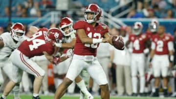 MIAMI, FL - DECEMBER 29: Tua Tagovailoa #13 of the Alabama Crimson Tide looks to pass against the Oklahoma Sooners during the College Football Playoff Semifinal at the Capital One Orange Bowl at Hard Rock Stadium on December 29, 2018 in Miami, Florida. (Photo by Michael Reaves/Getty Images)