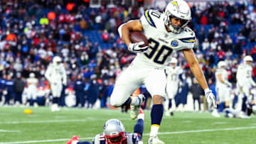 FOXBOROUGH, MASSACHUSETTS - JANUARY 13: Austin Ekeler #30 of the Los Angeles Chargers runs with the ball during the AFC Divisional Playoff Game against the New England Patriots at Gillette Stadium on January 13, 2019 in Foxborough, Massachusetts. (Photo by Adam Glanzman/Getty Images)