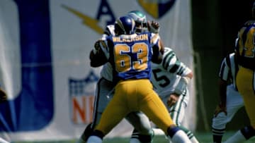 SAN DIEGO, CA - OCTOBER 6: Guard Doug Wilkerson #63 of the San Diego Chargers takes on defensive tackle Jerry Patton #77 of the Philadelphia Eagles at San Diego Stadium on October 6, 1974 in San Diego, California. The Eagles defeated the Chargers 13-7. (Photo by James Flores/Getty Images)
