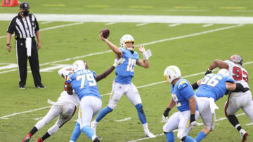 TAMPA, FLORIDA - OCTOBER 04: Justin Herbert #10 of the Los Angeles Chargers throws a pass during the fourth quarter of a game against the Tampa Bay Buccaneers at Raymond James Stadium on October 04, 2020 in Tampa, Florida. (Photo by James Gilbert/Getty Images)