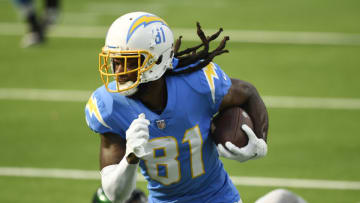 INGLEWOOD, CALIFORNIA - NOVEMBER 22: Mike Williams #81 of the Los Angeles Chargers breaks a tackle and scores a touchdown during the first half against the New York Jets at SoFi Stadium on November 22, 2020 in Inglewood, California. (Photo by Kevork Djansezian/Getty Images)