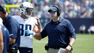 NASHVILLE, TN - AUGUST 19: Tight ends coach Arthur Smith of the Tennessee Titans talks with Phillip Supernaw #89 during a preseason game against the Carolina Panthers at Nissan Stadium on August 19, 2017 in Nashville, Tennessee. (Photo by Joe Robbins/Getty Images)