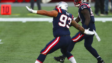 FOXBOROUGH, MASSACHUSETTS - OCTOBER 25: Lawrence Guy #93 of the New England Patriots reacts after a sack during a game against the San Francisco 49ers on October 25, 2020 in Foxborough, Massachusetts. (Photo by Adam Glanzman/Getty Images)