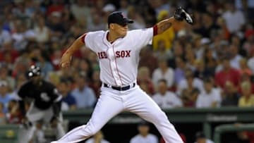 Aug 31, 2013; Boston, MA, USA; Boston Red Sox starting pitcher Jake Peavy (44) pitches during the third inning against the Chicago White Sox at Fenway Park. Mandatory Credit: Bob DeChiara-USA TODAY Sports