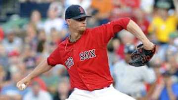 Jul 10, 2015; Boston, MA, USA; Boston Red Sox starting pitcher Clay Buchholz (11) pitches during the first inning against the New York Yankees at Fenway Park. Mandatory Credit: Bob DeChiara-USA TODAY Sports