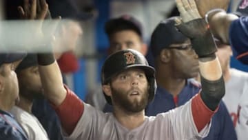 Sep 19, 2015; Toronto, Ontario, CAN; Boston Red Sox second baseman Dustin Pedroia (15) celebrates scoring a run during the ninth inning in a game against the Toronto Blue Jays at Rogers Centre. The Boston Red Sox won 7-6. Mandatory Credit: Nick Turchiaro-USA TODAY Sports