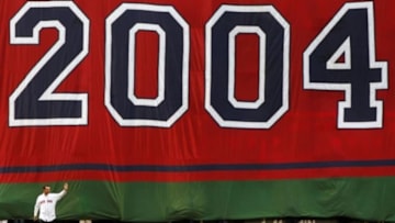May 28, 2014; Boston, MA, USA; Boston Red Sox former pitcher Tim Wakefield walks on the field as part of the 10 year celebration of the 2004 Boston Red Sox before the game against the Atlanta Braves at Fenway Park. Mandatory Credit: Greg M. Cooper-USA TODAY Sports