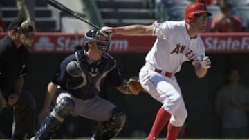 Sep 27, 2015; Anaheim, CA, USA; Los Angeles Angels left fielder David Murphy (19) follows through on a swing for a RBI single against the Seattle Mariners during the fourth inning at Angel Stadium of Anaheim. Mandatory Credit: Kelvin Kuo-USA TODAY Sports