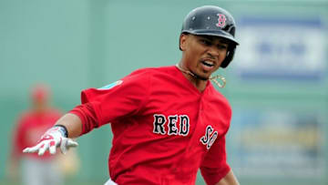 Mar 19, 2016; Fort Myers, FL, USA; Boston Red Sox outfielder Mookie Betts (50) celebrates after hitting a home run in the fifth inning against the St. Louis Cardinals at JetBlue Park. The Red Sox won 3-1 as the game was cancelled after five innings due to inclement weather. Mandatory Credit: Evan Habeeb-USA TODAY Sports