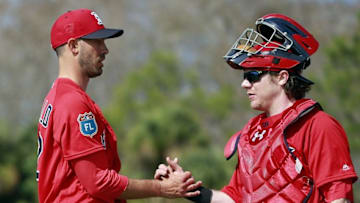 Feb 20, 2016; Lee County, FL, USA; Boston Red Sox starting pitcher Rick Porcello (22) and catcher Ryan Hanigan (10) hand shake as they get done throwing a bullpen at Jet Blue Park. Mandatory Credit: Kim Klement-USA TODAY Sports