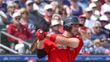 Mar 21, 2016; Jupiter, FL, USA; Boston Red Sox third baseman Travis Shaw (47) hits a double against the St. Louis Cardinals during the game at Roger Dean Stadium. The Red Sox defeated the Cardinals 4-3. Mandatory Credit: Scott Rovak-USA TODAY Sports