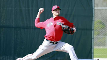 Feb 20, 2016; Lee County, FL, USA; Boston Red Sox starting pitcher Clay Buchholz (11) throws during a bullpen session at Jet Blue Park. Mandatory Credit: Kim Klement-USA TODAY Sports