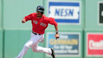 Mar 18, 2016; Fort Myers, FL, USA; Boston Red Sox outfielder Mookie Betts (50) runs to third base in the first inning against the Minnesota Twins at JetBlue Park. The Twins won 8-6. Mandatory Credit: Evan Habeeb-USA TODAY Sports