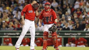 May 20, 2016; Boston, MA, USA; Boston Red Sox starting pitcher Clay Buchholz (11) speaks with Boston Red Sox catcher Christian Vazquez (7) as they take on the Cleveland Indians in the sixth inning at Fenway Park. Mandatory Credit: David Butler II-USA TODAY Sports