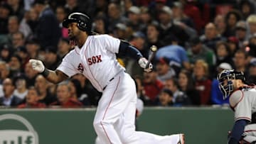 Apr 28, 2016; Boston, MA, USA; Boston Red Sox first baseman Hanley Ramirez (13) hits an RBI double during the third inning against the Atlanta Braves at Fenway Park. Mandatory Credit: Bob DeChiara-USA TODAY Sports