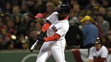 Apr 13, 2016; Boston, MA, USA; Boston Red Sox center fielder Jackie Bradley Jr. (25) hits a triple during the fourth inning against the Baltimore Orioles at Fenway Park. Mandatory Credit: Bob DeChiara-USA TODAY Sports