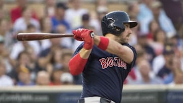 Jun 10, 2016; Minneapolis, MN, USA; Boston Red Sox third baseman Travis Shaw (47) hits single in the sixth inning against the Minnesota Twins at Target Field. Mandatory Credit: Jesse Johnson-USA TODAY Sports