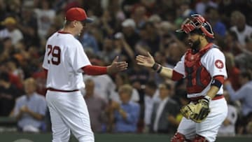 Jul 20, 2016; Boston, MA, USA; Boston Red Sox relief pitcher Brad Ziegler (29) is congratulated by catcher Sandy Leon (3) after defeating the San Francisco Giants at Fenway Park. Mandatory Credit: Bob DeChiara-USA TODAY Sports