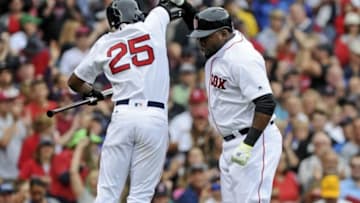 Jul 10, 2016; Boston, MA, USA; Boston Red Sox center fielder Jackie Bradley Jr. (25) reacts with designated hitter David Ortiz (34) after hitting a two run home run during the first inning at Fenway Park. Mandatory Credit: Bob DeChiara-USA TODAY Sports