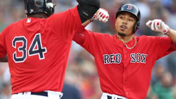 Jul 22, 2016; Boston, MA, USA; Boston Red Sox right fielder Mookie Betts (right) celebrates his home run against the Minnesota Twins with designated hitter David Ortiz (34) during the first inning at Fenway Park. Mandatory Credit: Mark L. Baer-USA TODAY Sports