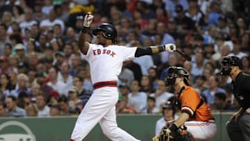 Jul 20, 2016; Boston, MA, USA; Boston Red Sox first baseman Hanley Ramirez (13) hits his second home run of the game during the third inning against the San Francisco Giants at Fenway Park. Mandatory Credit: Bob DeChiara-USA TODAY Sports