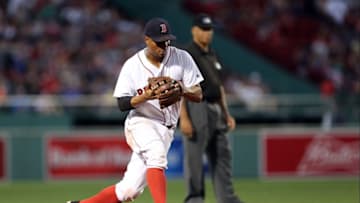 Jul 5, 2016; Boston, MA, USA; Boston Red Sox shortstop Xander Bogaerts (2) throws to first base against the Texas Rangers during the fourth inning at Fenway Park. Mandatory Credit: Mark L. Baer-USA TODAY Sports