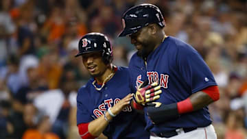 Aug 19, 2016; Detroit, MI, USA; Boston Red Sox right fielder Mookie Betts (50) and designated hitter David Ortiz (34) celebrate after they score in the seventh inning against the Detroit Tigers at Comerica Park. Mandatory Credit: Rick Osentoski-USA TODAY Sports
