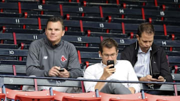 Apr 14, 2015; Boston, MA, USA; Boston Red Sox general manager Ben Cherington (left) watches batting practice from the stands prior to a game against the Washington Nationals at Fenway Park. Mandatory Credit: Bob DeChiara-USA TODAY Sports