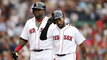 Aug 31, 2016; Boston, MA, USA; Boston Red Sox designated hitter David Ortiz (34) reacts with center fielder Jackie Bradley Jr. (25) during the eighth inning against the Tampa Bay Rays at Fenway Park. Mandatory Credit: Greg M. Cooper-USA TODAY Sports