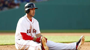 Jun 4, 2016; Boston, MA, USA; Boston Red Sox third baseman Travis Shaw (47) sits in the dirt after being tagged out in a rundown between first and second during the fifth inning against the Toronto Blue Jays at Fenway Park. Shaw was tagged out on the play. Mandatory Credit: Winslow Townson-USA TODAY Sports