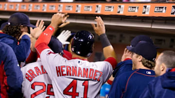Jun 7, 2016; San Francisco, CA, USA; Boston Red Sox second baseman Marco Hernandez (41) celebrates with teammates in the dugout after scoring against the San Francisco Giants in the tenth inning at AT&T Park. Mandatory Credit: John Hefti-USA TODAY Sports