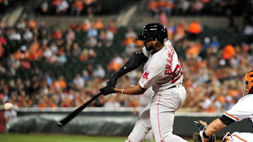 Sep 22, 2016; Baltimore, MD, USA; Boston Red Sox outfielder Jackie Bradley, Jr. (25) triples in the second inning against the Baltimore Orioles at Oriole Park at Camden Yards. Mandatory Credit: Evan Habeeb-USA TODAY Sports