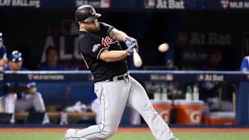 Oct 19, 2016; Toronto, Ontario, CAN; Cleveland Indians designated hitter Mike Napoli (26) hits an RBI double during the first inning against the Toronto Blue Jays in game five of the 2016 ALCS playoff baseball series at Rogers Centre. Mandatory Credit: Nick Turchiaro-USA TODAY Sports