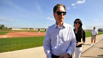 Feb 24, 2015; Ft. Myers, FL, USA; Boston Red Sox owner John W. Henry and his wife Linda Pizzuti watch workout drills at JetBlue Park. Mandatory Credit: Steve Mitchell-USA TODAY Sports
