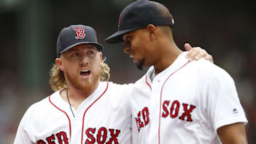 Aug 31, 2016; Boston, MA, USA; Boston Red Sox pitcher Robbie Ross Jr. (28) talks with shortstop Xander Bogaerts (2) during the fifth inning against the Tampa Bay Rays at Fenway Park. Mandatory Credit: Greg M. Cooper-USA TODAY Sports