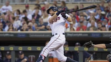 Jun 16, 2016; Minneapolis, MN, USA; Minnesota Twins designated hitter Trevor Plouffe (24) hits a single in the fifth inning against the New York Yankees at Target Field. Mandatory Credit: Jesse Johnson-USA TODAY Sports