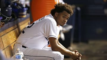 Sep 23, 2016; St. Petersburg, FL, USA; Tampa Bay Rays starting pitcher Chris Archer (22) looks on from the dugout during the third inning against the Boston Red Sox at Tropicana Field. Mandatory Credit: Kim Klement-USA TODAY Sports