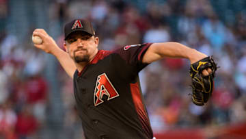 PHOENIX, ARIZONA - JUNE 22: Zack Godley #52 of the Arizona Diamondbacks delivers a pitch during the first inning of the MLB game against the San Francisco Giants at Chase Field on June 22, 2019 in Phoenix, Arizona. (Photo by Jennifer Stewart/Getty Images)