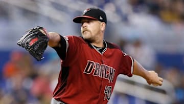 MIAMI, FLORIDA - JULY 28: Andrew Chafin #40 of the Arizona Diamondbacks delivers a pitch in the seventh inning against the Miami Marlins at Marlins Park on July 28, 2019 in Miami, Florida. (Photo by Michael Reaves/Getty Images)