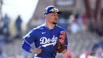 GLENDALE, ARIZONA - FEBRUARY 26: Mookie Betts #50 of the Los Angeles Dodgers runs back to the dugout from right field during a spring training game against the Los Angeles Angels at Camelback Ranch on February 26, 2020 in Glendale, Arizona. (Photo by Norm Hall/Getty Images)