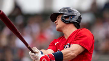 FT. MYERS, FL - MARCH 31: Bobby Dalbec #29 of the Boston Red Sox hits a solo home run during the second inning of a Grapefruit League game against the Minnesota Twins on March 31, 2022 at jetBlue Park at Fenway South in Fort Myers, Florida. (Photo by Billie Weiss/Boston Red Sox/Getty Images)