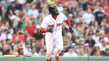 BOSTON, MA - MAY 21: Franchy Cordero #16 of the Boston Red Sox hits a triple in the eighth inning against the Seattle Mariners at Fenway Park on May 21, 2022 in Boston, Massachusetts. (Photo by Kathryn Riley/Getty Images)