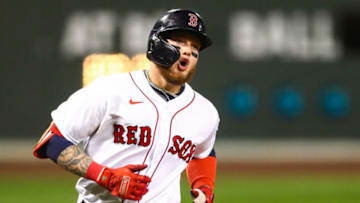 Alex Verdugo of the Boston Red Sox reacts to hitting a solo home run. (Photo by Adam Glanzman/Getty Images)