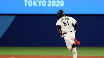 YOKOHAMA, JAPAN - AUGUST 02: Seiya Suzuki #51 of Team Japan rounds the bases after hitting a solo home run in the fifth inning against Team United States during the knockout stage of men's baseball on day ten of the Tokyo 2020 Olympic Games at Yokohama Baseball Stadium on August 02, 2021 in Yokohama, Kanagawa, Japan. (Photo by Koji Watanabe/Getty Images)