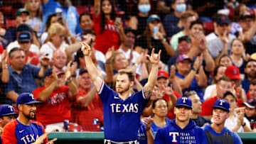 BOSTON, MASSACHUSETTS - AUGUST 20: Brock Holt #16 of the Texas Rangers reacts as the fans acknowledge him in the bottom of the first inning of the game against the Boston Red Sox at Fenway Park on August 20, 2021 in Boston, Massachusetts. (Photo by Omar Rawlings/Getty Images)